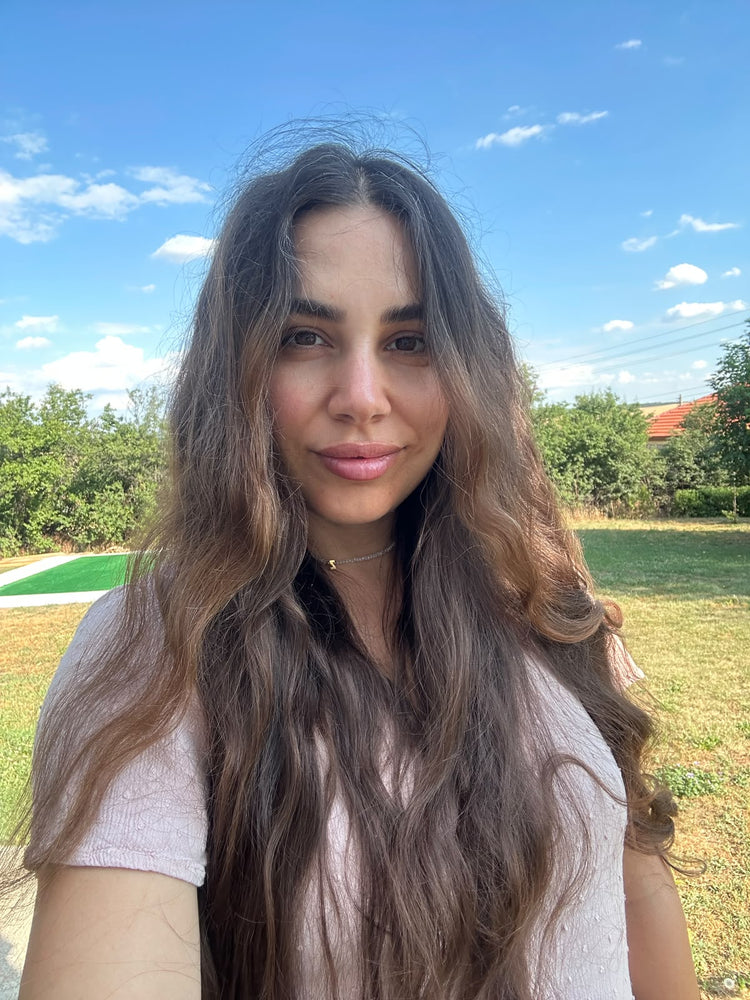 Romina Babek, founder of Angry Mama, smiling outdoors